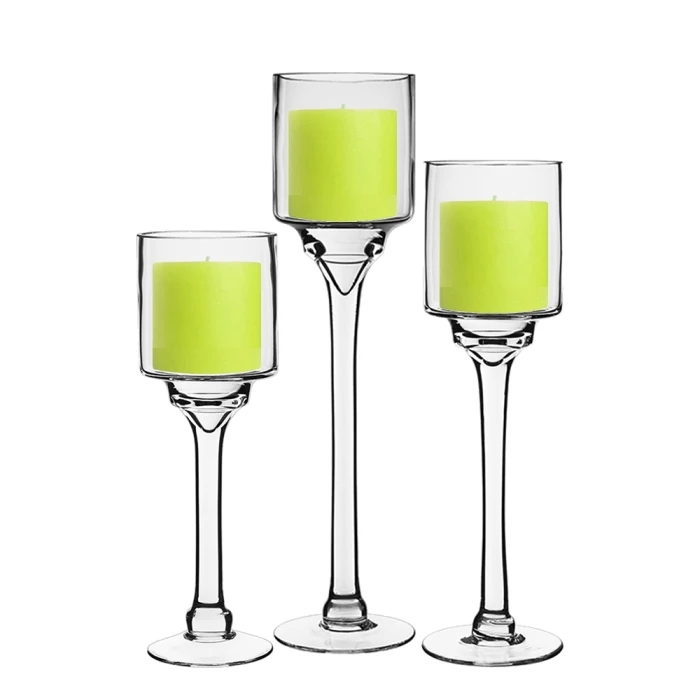Long Stem Glass Candle Holder Set Of 3. H-12"/14"/16" X D-4" (Pack Of 6 Sets - 18 Pcs) 1 Long Stem Glass Candle Holder Set Of 3. H-12"/14"/16" X D-4" (Pack Of 6 Sets - 18 Pcs)